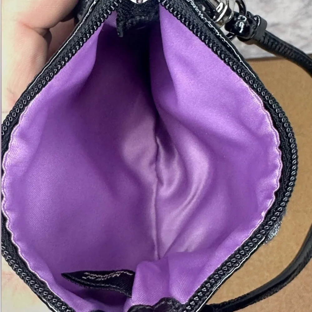 Coach wristlet crafted